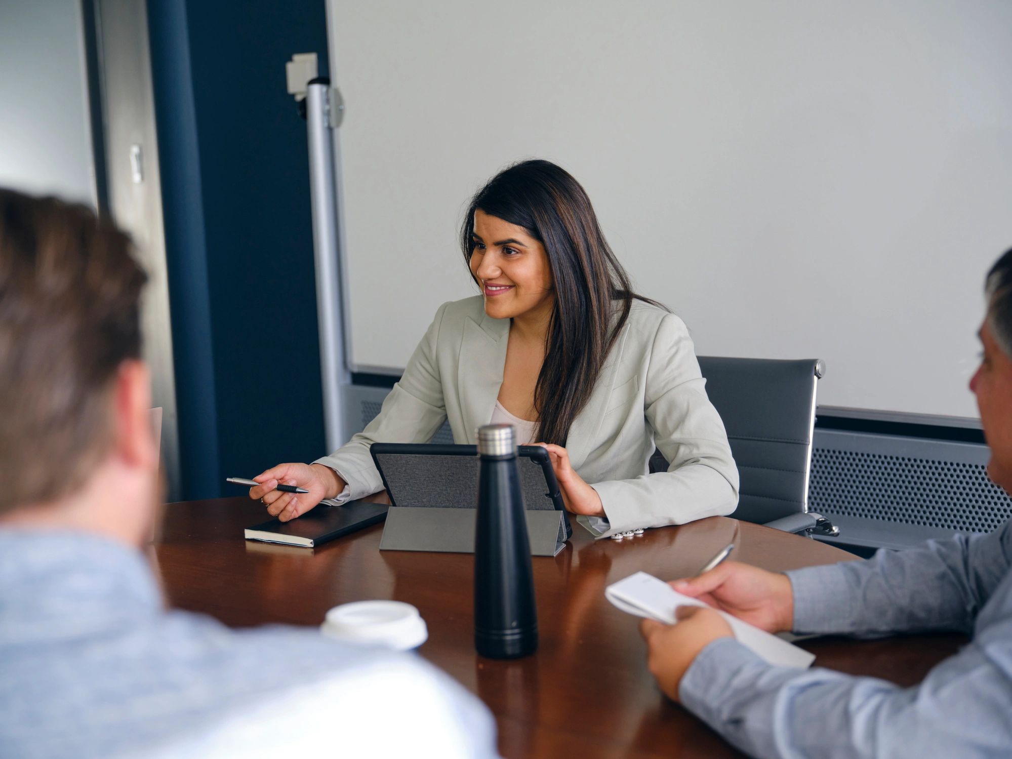 Professional advisory team in office setting